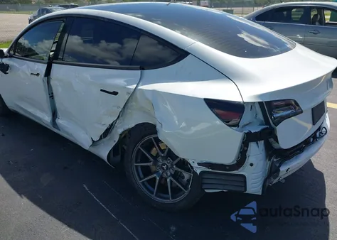 2021 Tesla Model 3 Standard Range Plus Rear-Wheel Drive from USA, damaged, VIN 5YJ3E1EA2MF094069